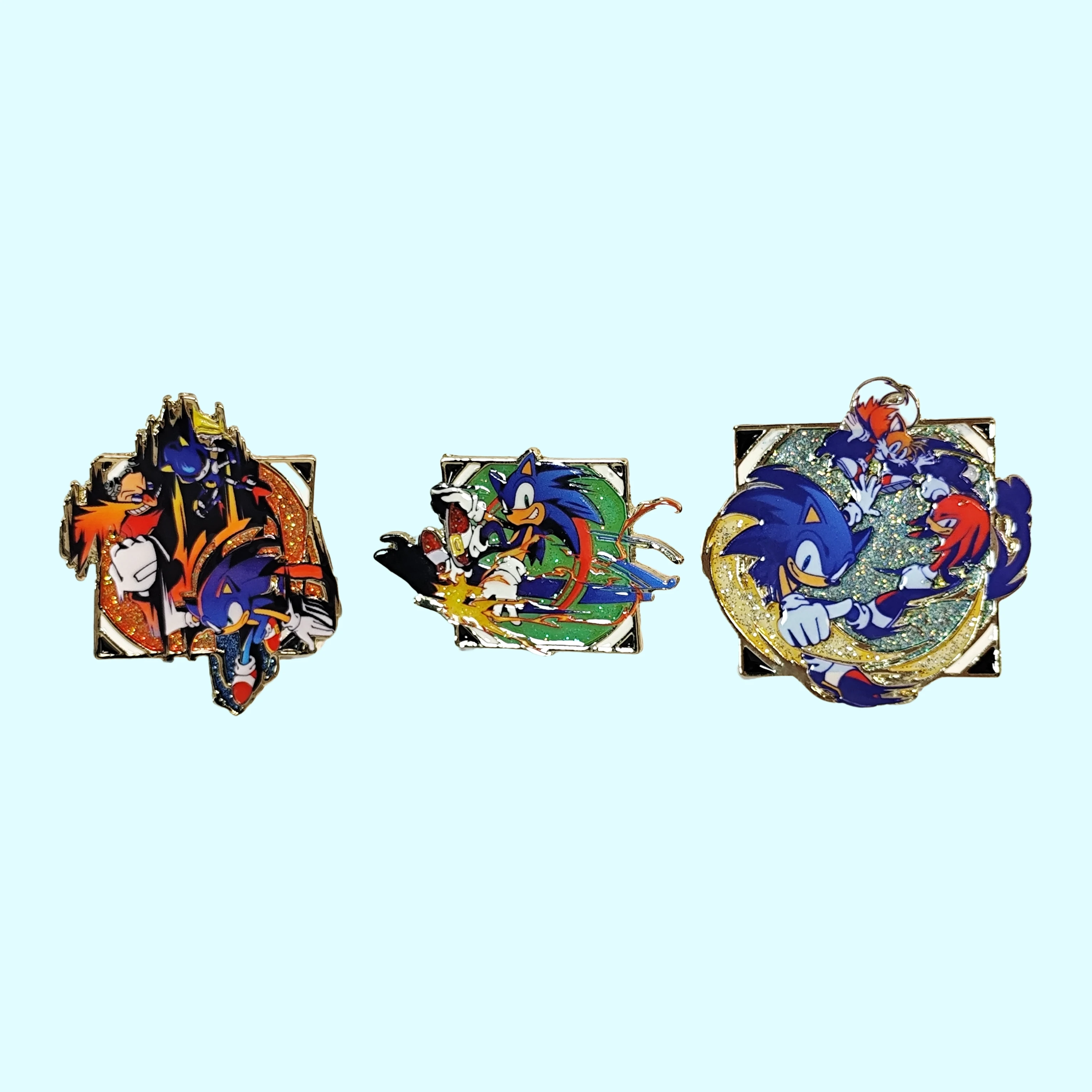 Vibrant enamel pins with dynamic characters. Intricate, glittery, liven up bags/jackets.