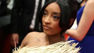 Simone Biles responds to comment about Swift, Kelce wedding invite